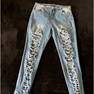 Light blue ripped jeans
